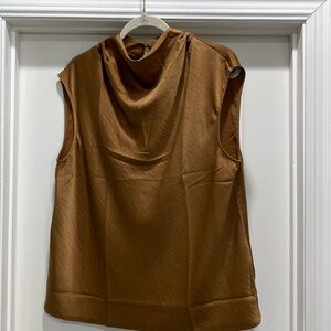 Tobacco blouse. Slightly cap sleeve with small
Drape neck. Never worn.
